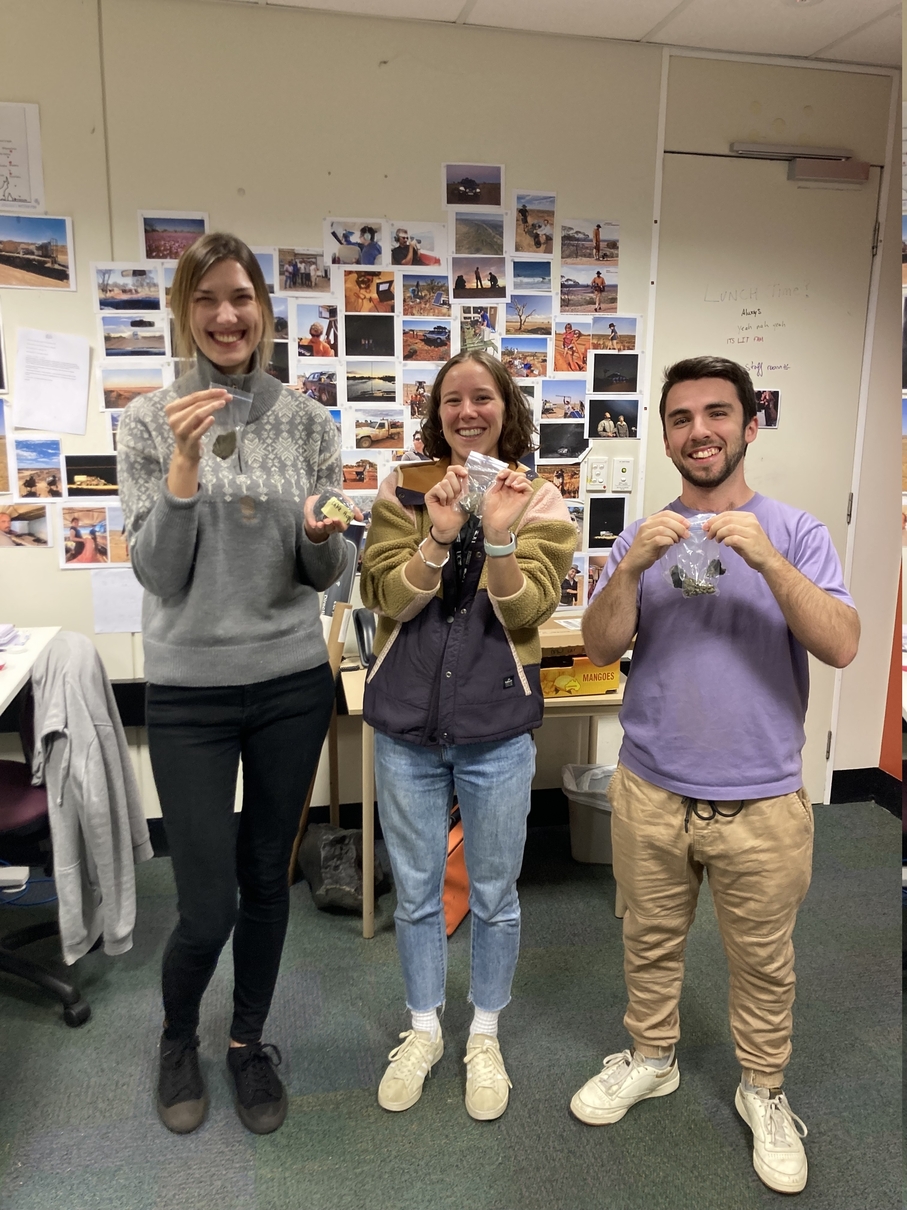 Ola, Sophie, and Michael with fresh space rock samples in their hands.
